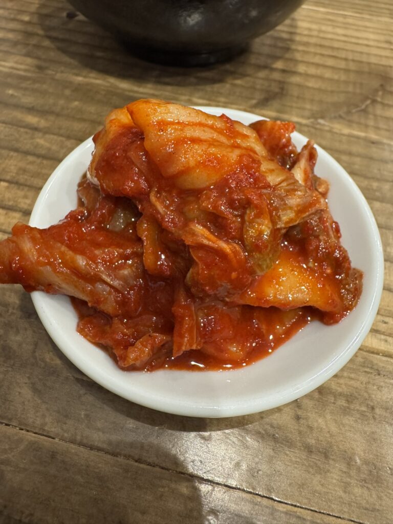 トッピングの白菜キムチの写真。